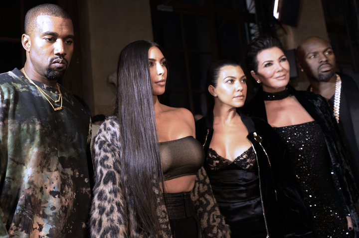 (From L) Kanye West, Kim Kardashian, Kourtney Kardashian, Kris Jenner and Corey Gamble attend the Off-white 2017 Spring/Summer ready-to-wear collection fashion show, on September 29, 2016 in Paris. / AFP / ALAIN JOCARD (Photo credit should read ALAIN JOCARD/AFP/Getty Images)